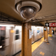 Photo of security camera in subway station